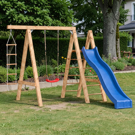 Gartenholz.org Bestwig wooden play tower with a red swing, blue slide, and climbing ladder in a garden setting.